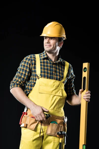 Construction worker with level tool — Stock Photo, Image