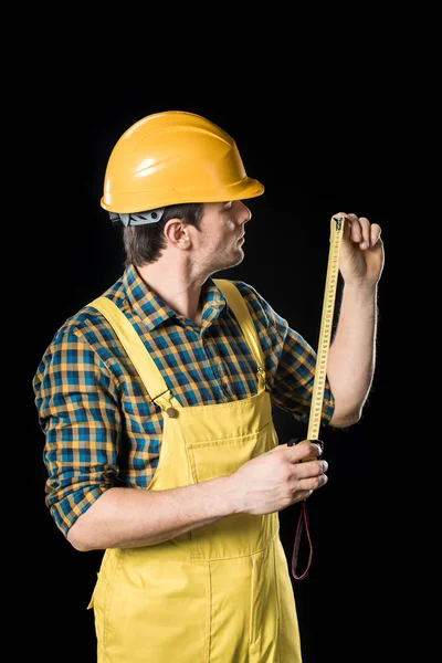 Workman with meter roller — Stock Photo, Image