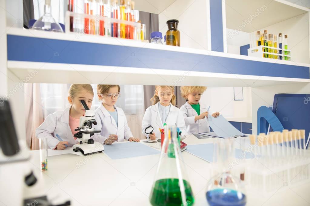 Schoolchildren studying in laboratory   