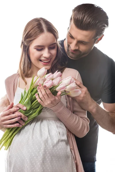 Fiatal pár és a virágok — Stock Fotó