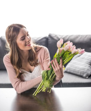 Woman with fresh flowers clipart
