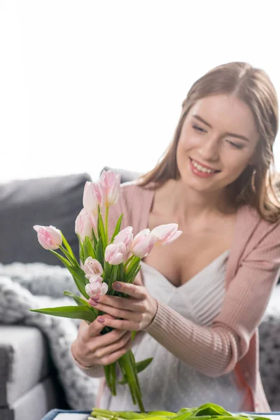 Woman with fresh flowers — Stock Photo, Image