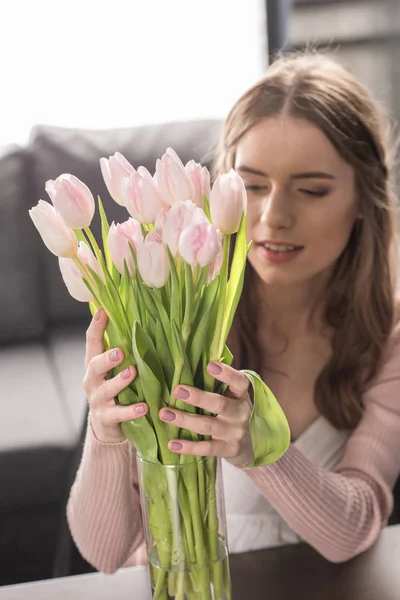 Woman with fresh flowers — Stock Photo, Image