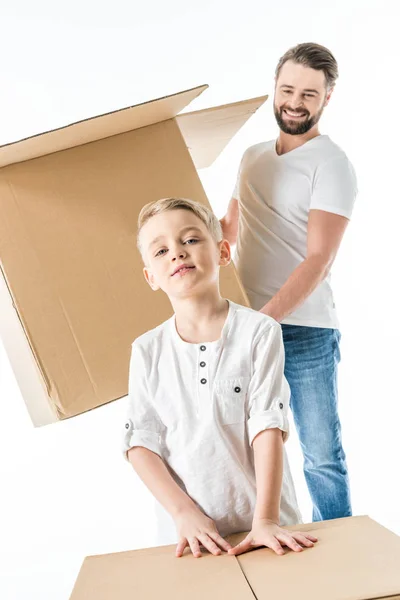 Father and son with boxes — Free Stock Photo