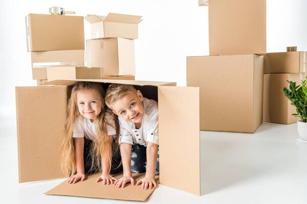 Kids in cardboard box