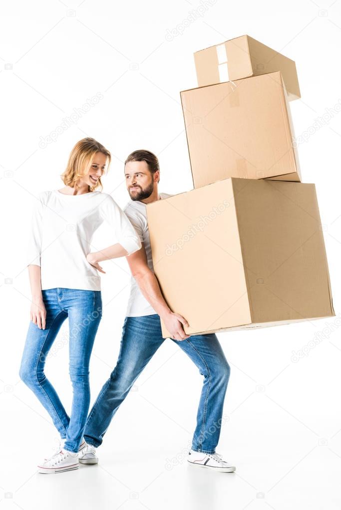 Couple with cardboard boxes 