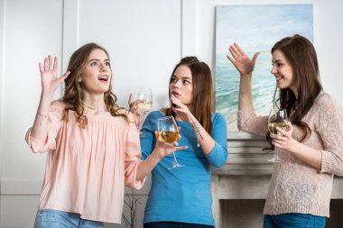 Women drinking wine  clipart