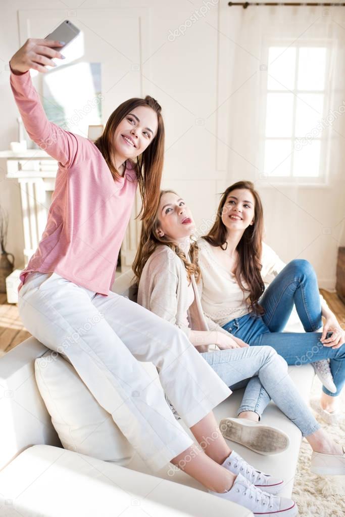 Young women taking selfie