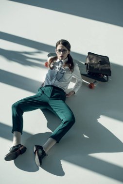 hipster woman with skateboard