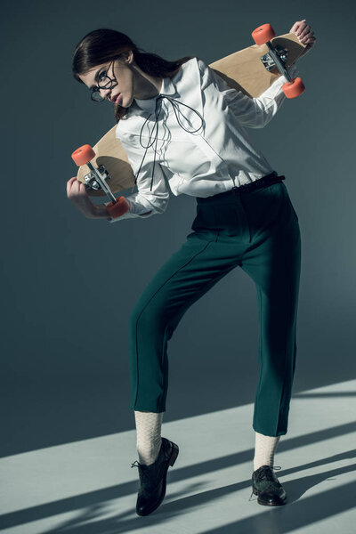 hipster woman with skateboard