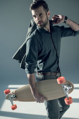 stylish man holding jacket