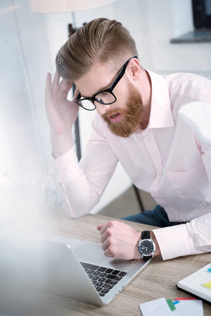 businessman working at table