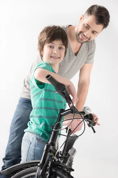 Father and son with bicycle — Stock Photo, Image