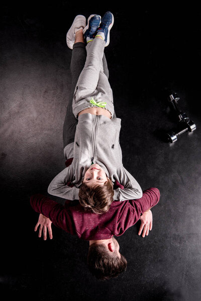 Father and son exercising