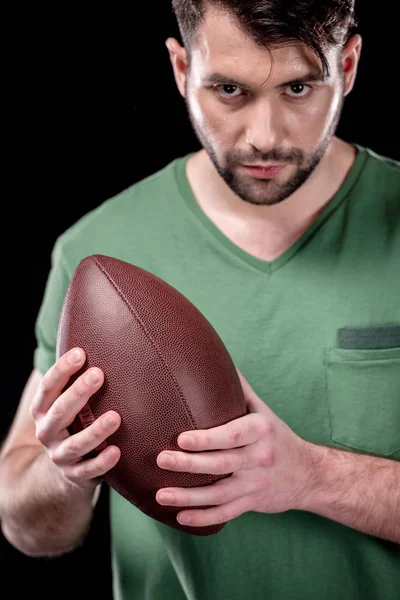 Homem com bola de rugby — Fotografia de Stock