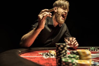 Man playing poker clipart