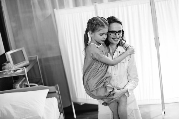 Doctor with little patient