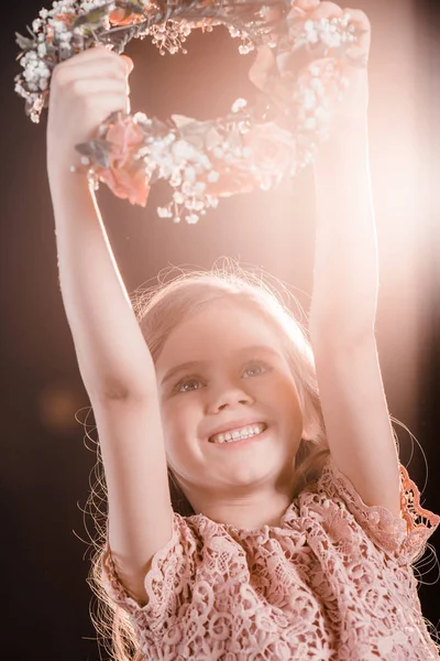 Girl with flowers wreath — Stock Photo, Image