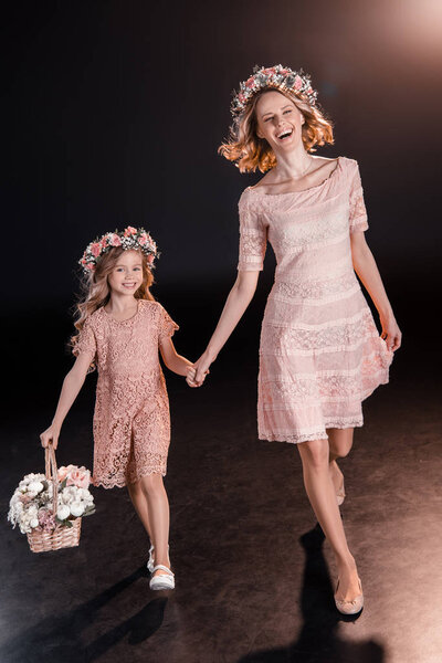 Mother and daughter in wreaths