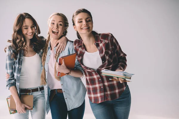 Jeunes étudiants avec des manuels scolaires — Photo