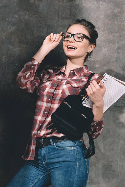 Smiling student with copybook — Stock Photo, Image