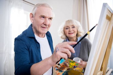 Senior couple painting clipart