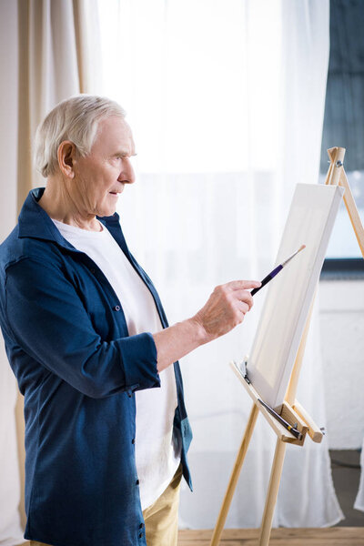 Man painting picture