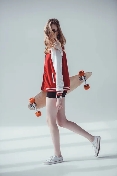 Hipster woman with longboard — Stock Photo, Image