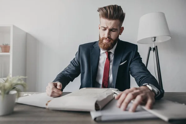 Businessman with documents and folders — Stock Photo, Image