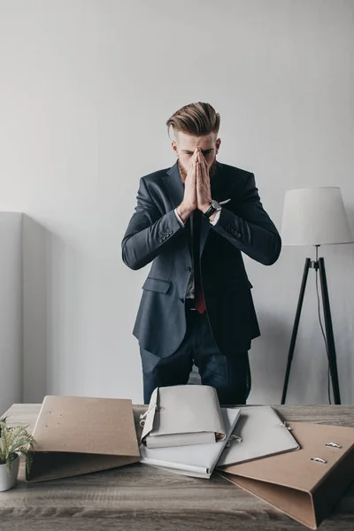 Businessman with documents and folders — Stock Photo, Image