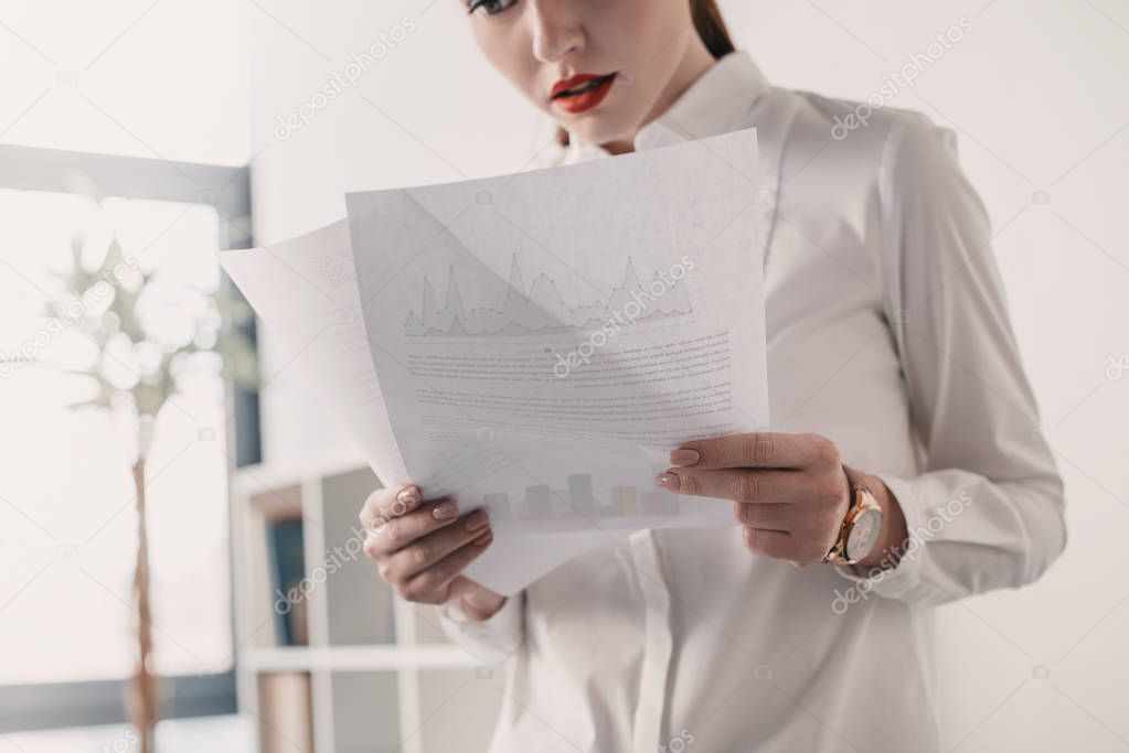 businesswoman reading documents