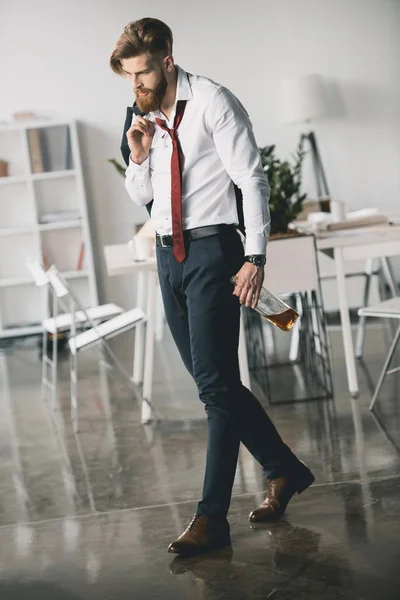 Drunk businessman in office — Stock Photo, Image