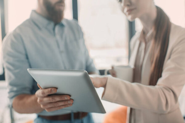 Business people with digital tablet 