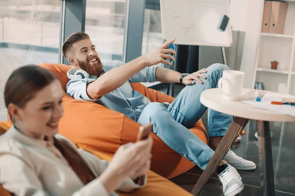 Business people resting in office — Stock Photo, Image