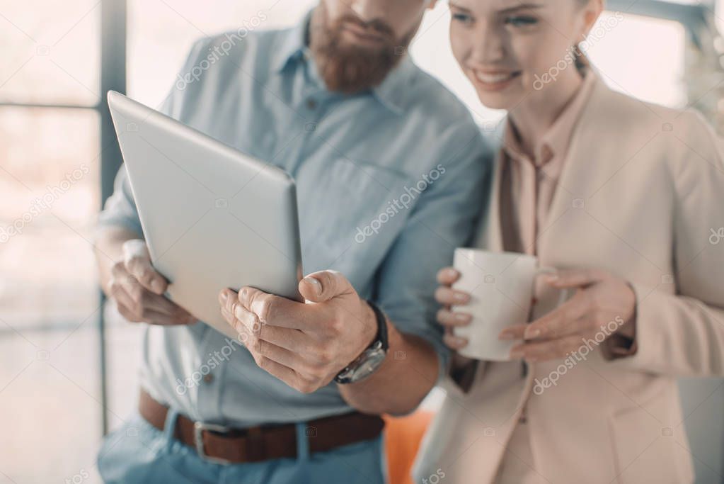 Business people with digital tablet 