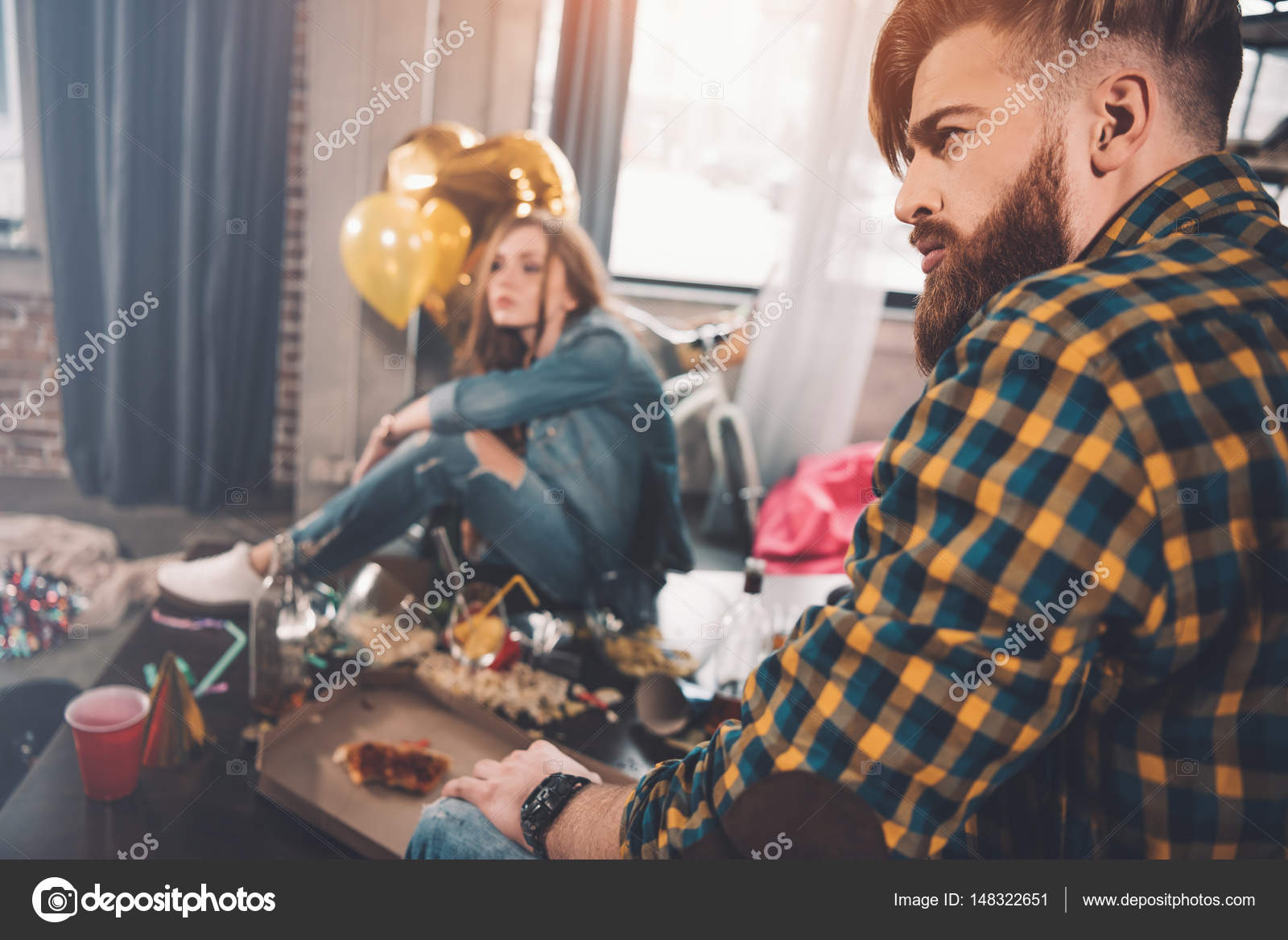 Couple with hangover after party — Stock Photo © ArturVerkhovetskiy 148322651
