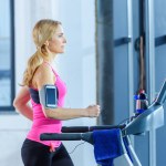 Sporty woman on treadmill