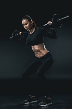 sportswoman training with barbell clipart