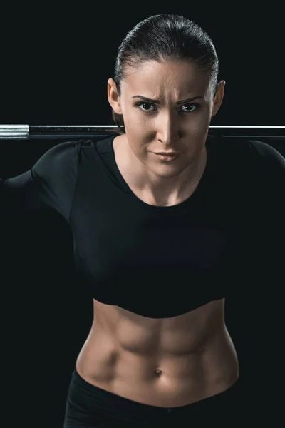 กีฬาหญิงฝึกกับบาร์เบลล์ — ภาพถ่ายสต็อก
