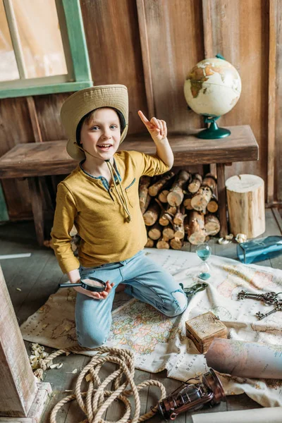 Little boy with magnifier — Free Stock Photo