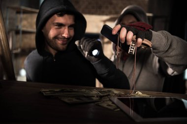 Robbers stealing money clipart