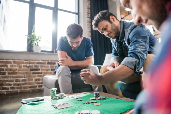 Men at gaming table — Stock Photo, Image