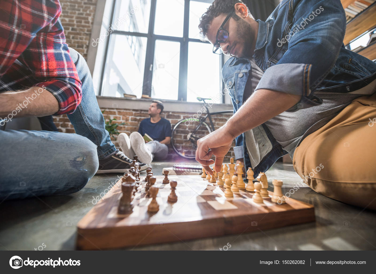 friends playing chess, Stock image