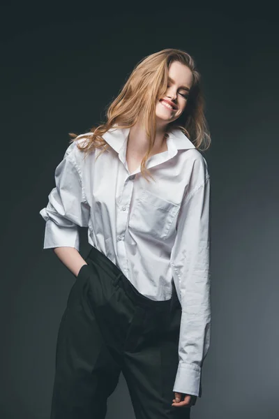 Woman standing and posing on black — Stock Photo, Image