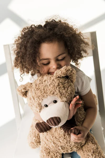 Baby girl with teddy bear — Stock Photo, Image