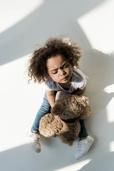 Baby girl with teddy bear — Stock Photo, Image