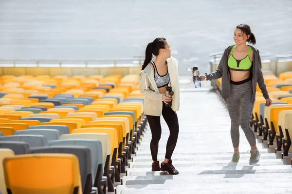 Young sportswomen on stadium — Stock Photo, Image