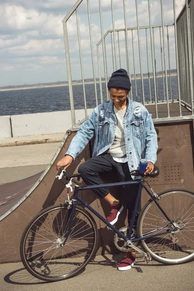 African american teenager with bicycle — Stock Photo, Image