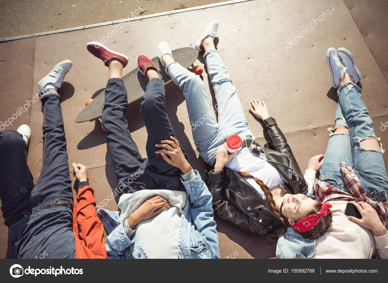 Teenagers group having fun — Stock Photo © ArturVerkhovetskiy #150992766