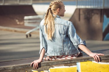 stylish girl at skateboard park  clipart